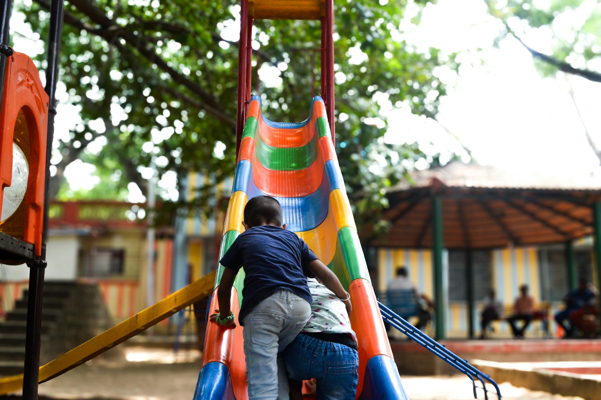 A couple of people that are on a slide